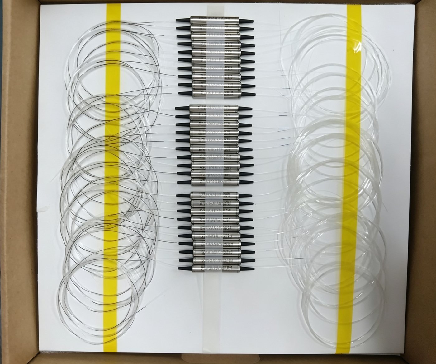 1x2 FWDM devices with connectorized pigtails, packed for shipment
